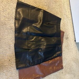 two pleather skirts blk and brown size large brand new will give you both